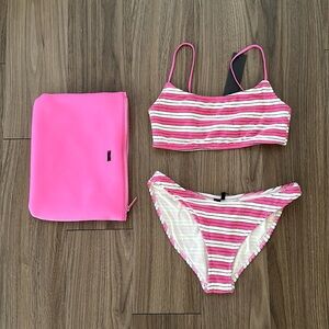 TRIANGL BIKINI SET - TOP IS SIZE S++ AND BOTTOMS ARE A SIZE M. RUNS SMALL